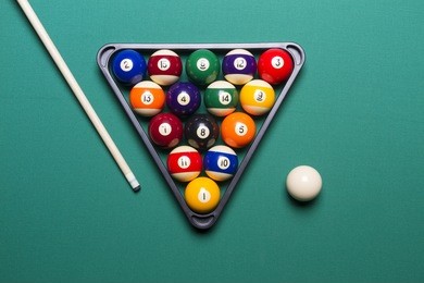 billiard balls arranged in a triangle viewed from above