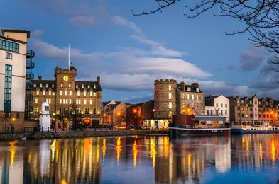 historic building along the old leith docks in edinburgh, scotland, at dusk