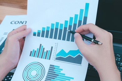 business statistics success concept : businessman analytics financial accounting market chart and graph line  ,selective focus. 