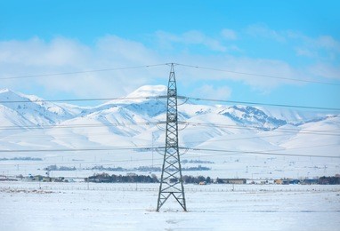 winter landscape, electric pole in the snow