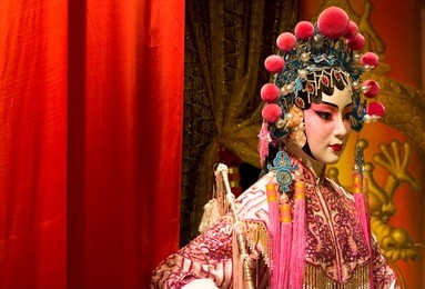 chinese opera dummy and red cloth as text space ,it is a toy,not real man
