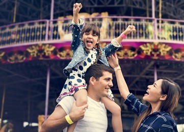 family holiday vacation amusement park togetherness