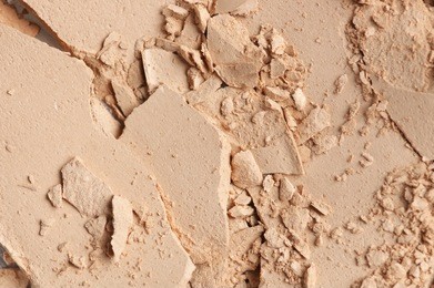 broken and messy facial compact powder close-up texture. shallow dof.