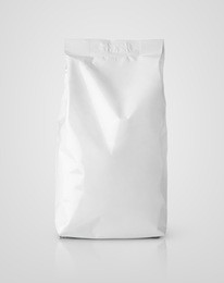 blank snack white paper bag package on gray. plastic packaging with clipping path