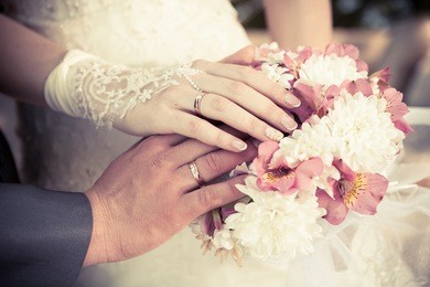 bride groom and wedding rings
