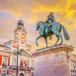 the puerta del sol square is the main public square in the city of madrid, spain. in the middle of the square is located the office of the president of the community of madrid.