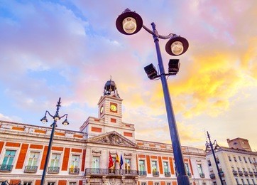the puerta del sol square is the main public square in the city of madrid, spain. in the middle of the square is located the office of the president of the community of madrid.