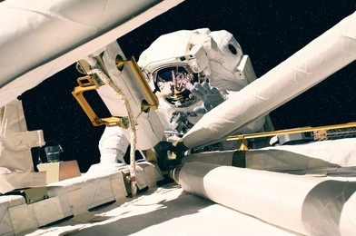 astronaut and spacecraft (speceship) in the outer space. stars on the background . "the elements of this image furnished by nasa"