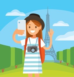 traveler girl makes selfie by eiffel tower