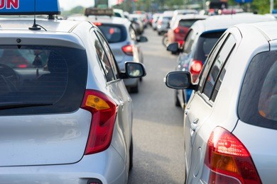 cars on urban street in traffic jam