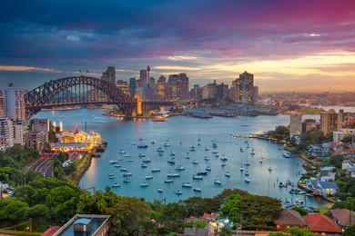 sydney. cityscape image of sydney, australia with harbour bridge and sydney skyline during sunset.