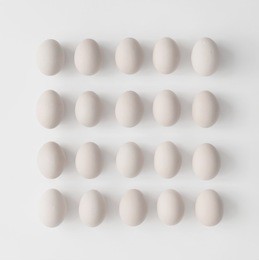creative layout made of eggs on white background. flat lay. easter concept.