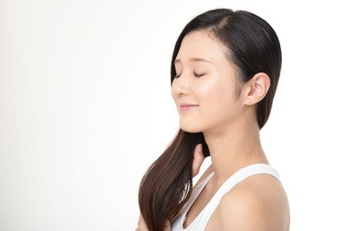 woman taking care of her hair