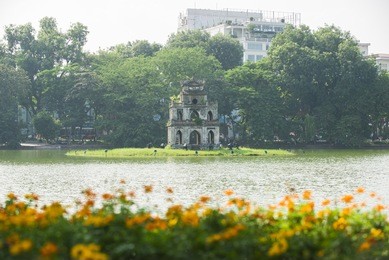 turtle tower on sunset. inside hoan kiem lake - a little lake in the old part of hanoi, vietnam, turtle tower is the symbol of hanoi,vietnam.