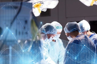 surgery, healthcare, medicine and people concept - group of surgeons at operation in operating room at hospital with virtual diagram projection