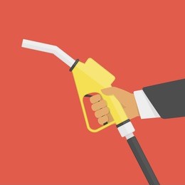 fuel pump in hand isolated on red background. hand holding fuel nozzle. gas station sign. petrol station concept. vector illustration flat design style. eps 10.