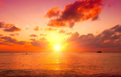 sunset beach with beautiful sky landscape. travel, tourism, vacation concept background. mexico. paradise scene of caribbean sea island. sun, sand, clouds and waves