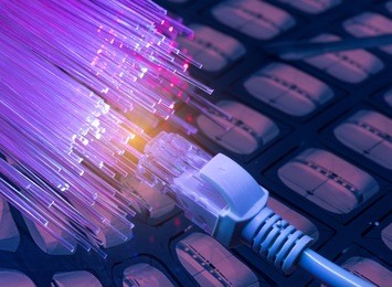network cables closeup with fiber optical background
