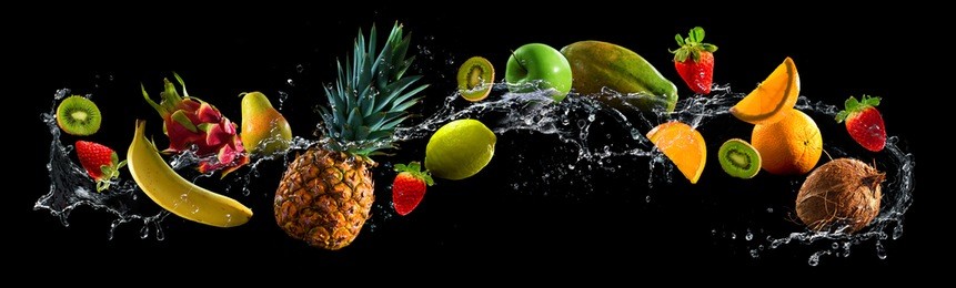 fruits on black background with water splash