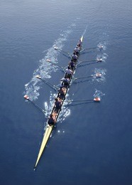 eight men rowing