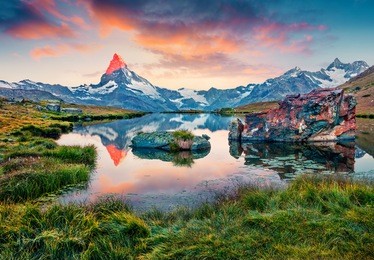 colorful summer sunrise on the stellisee lake. splendid outdoor scene with matterhorn (monte cervino, mont cervin) in swiss alps, switzerland, europe. beauty of nature concept background.