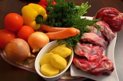 still life of lamb with vegetables