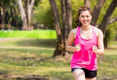 woman fitness outdoor concept, young asian beautiful woman/sport girl running walking at outdoor park with fresh, relax, happy feeling.