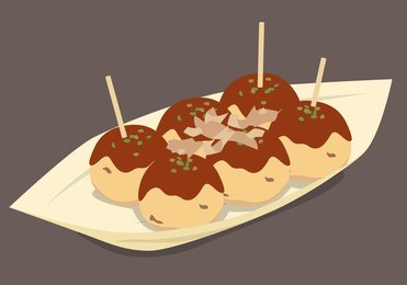 japanese street snacks : takoyaki (ball-shaped flour batter filled with diced octopus)