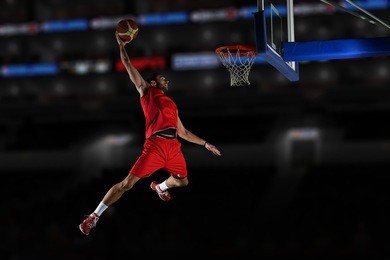 basketball game sport player in action isolated on black background