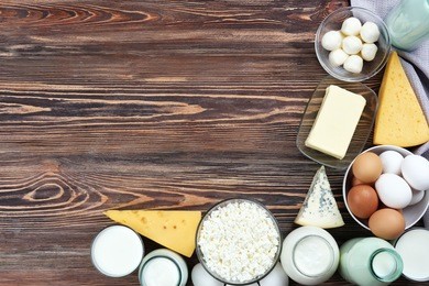 fresh dairy products on wooden background
