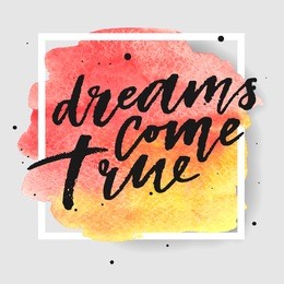 dreams come true hand drawn lettering on watercolor splash on watercolor splash in red and yellow colors.