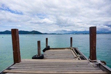 jetty at mamutik island in kota kinabalu, sabah borneo, malaysia. mamutik island is one of five islands in tunku abdul rahman national marine park