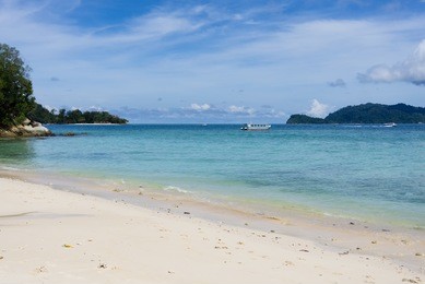 beach at mamutik island in kota kinabalu, sabah borneo, malaysia. mamutik island is one of five islands in tunku abdul rahman national marine park