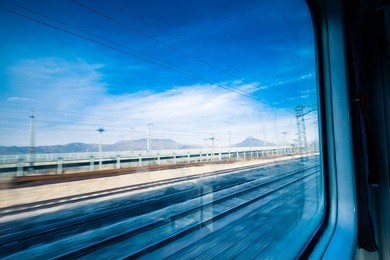 railroad tracks seen through train window