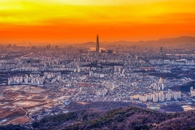 view of downtown cityscape and seoul tower in seoul, south korea.