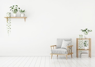 white livingroom interior in nordic style with gray armchair, pillow and green plants. 3d rendering.