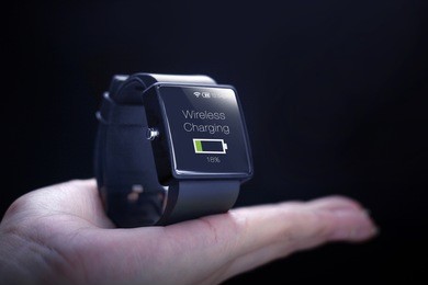 wireless charging icon with smartwatch. wireless charging have made life a little bit easier for smartwatch users.