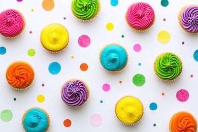 colorful cupcakes on a white background