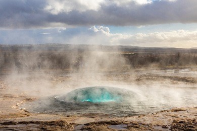 strokkur geysir hot spring eruption in golden circle  iceland.