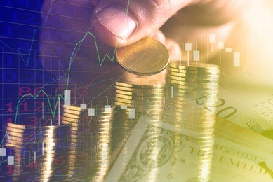 hand putting money coins stack in finance and banking concept.