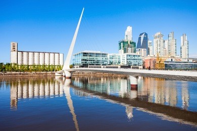 puente de la mujer (womens bridge), is a rotating footbridge for dock 3 of the puerto madero district of buenos aires, argentina