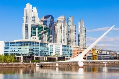 puente de la mujer (womens bridge), is a rotating footbridge for dock 3 of the puerto madero district of buenos aires, argentina