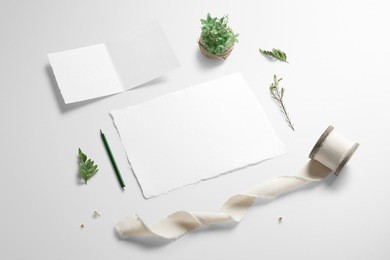 letterhead, greetings card scene mockup, perspective view, with decor elements, plants and blank copy, logo space on white background.