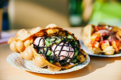 the hong kong waffles and paper coffee cup