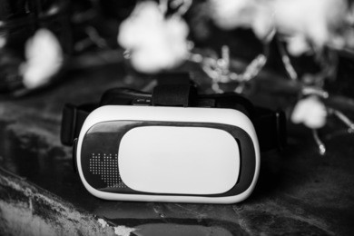 modern virtual reality vr glasses to play mobile game app on smart phone.portable gaming headset device for smartphone.play video games on the go.popular new gamer gadget.augmented reality concept
