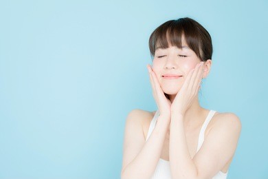attractive asian woman beauty image isolated on blue background