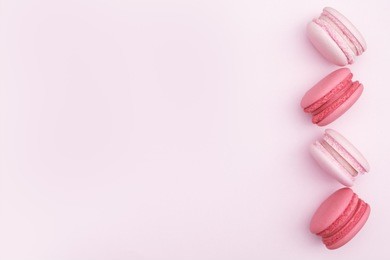 macarons on pink background, beautiful dessert, flat lay style with copy space to write.