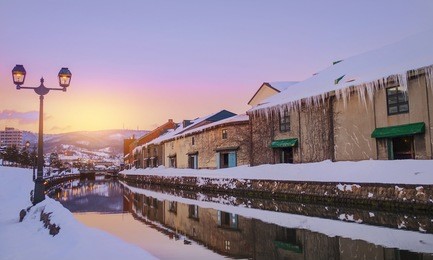 view of otaru canel in winter season with sunset, hokkaido - japan.