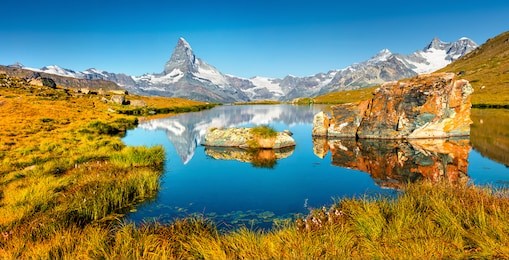 colorful summer panorama of the stellisee lake. great outdoor scene with matterhorn (monte cervino, mont cervin) in swiss alps, zermatt location, valais canton, switzerland, europe.
