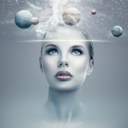 futuristic portrait of young woman with virtual hologram display showing space and planets
